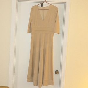 Blush v-neck formal dress with 3/4 sleeves and pockets